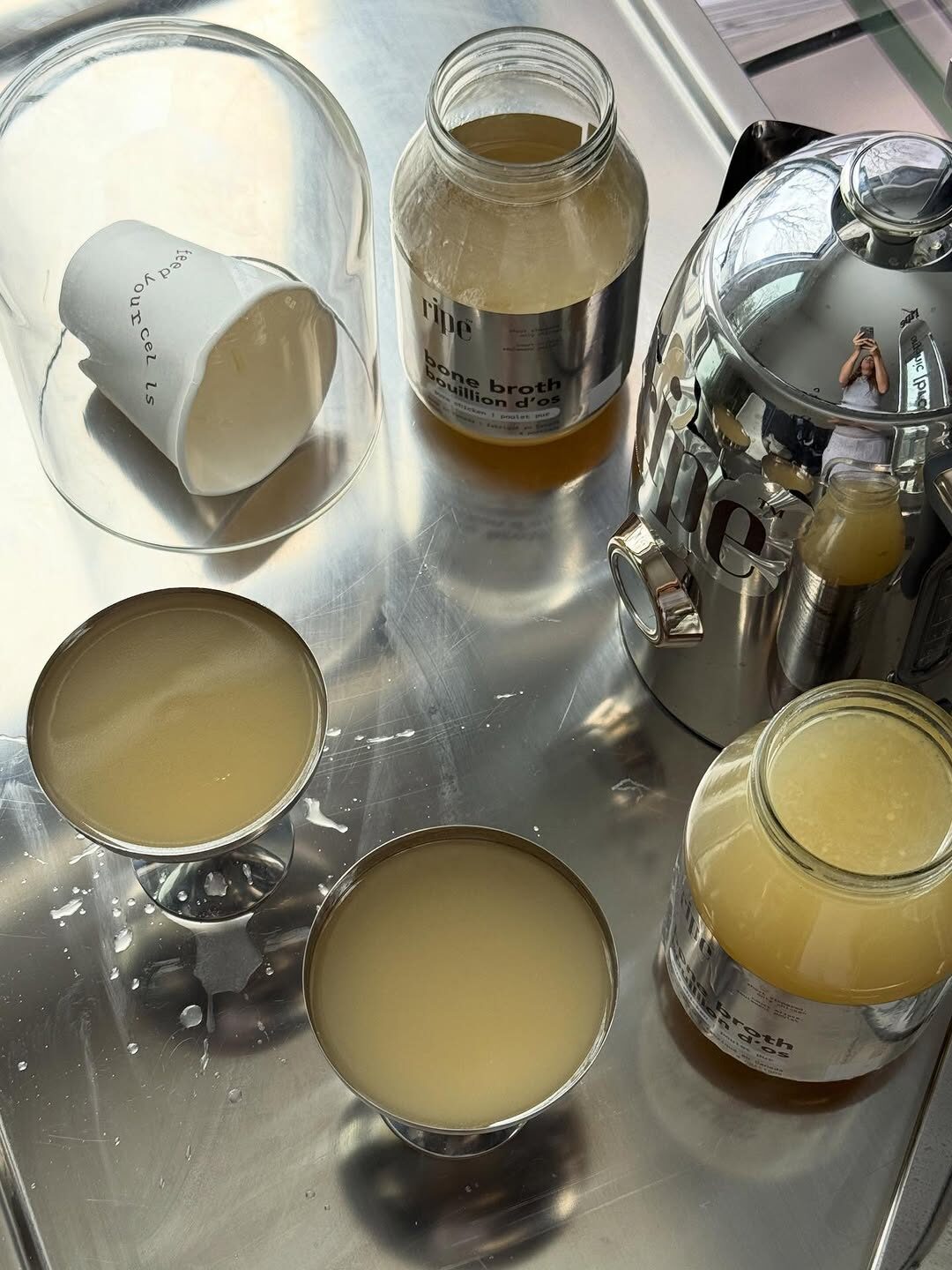 RIPE bone broth pop-up bar tray with cocktail glasses and branded jars