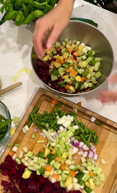 Mixed bean rainbow salad in a wide bowl, brightly coloured pulses and herbs — RIPE Europe recipe